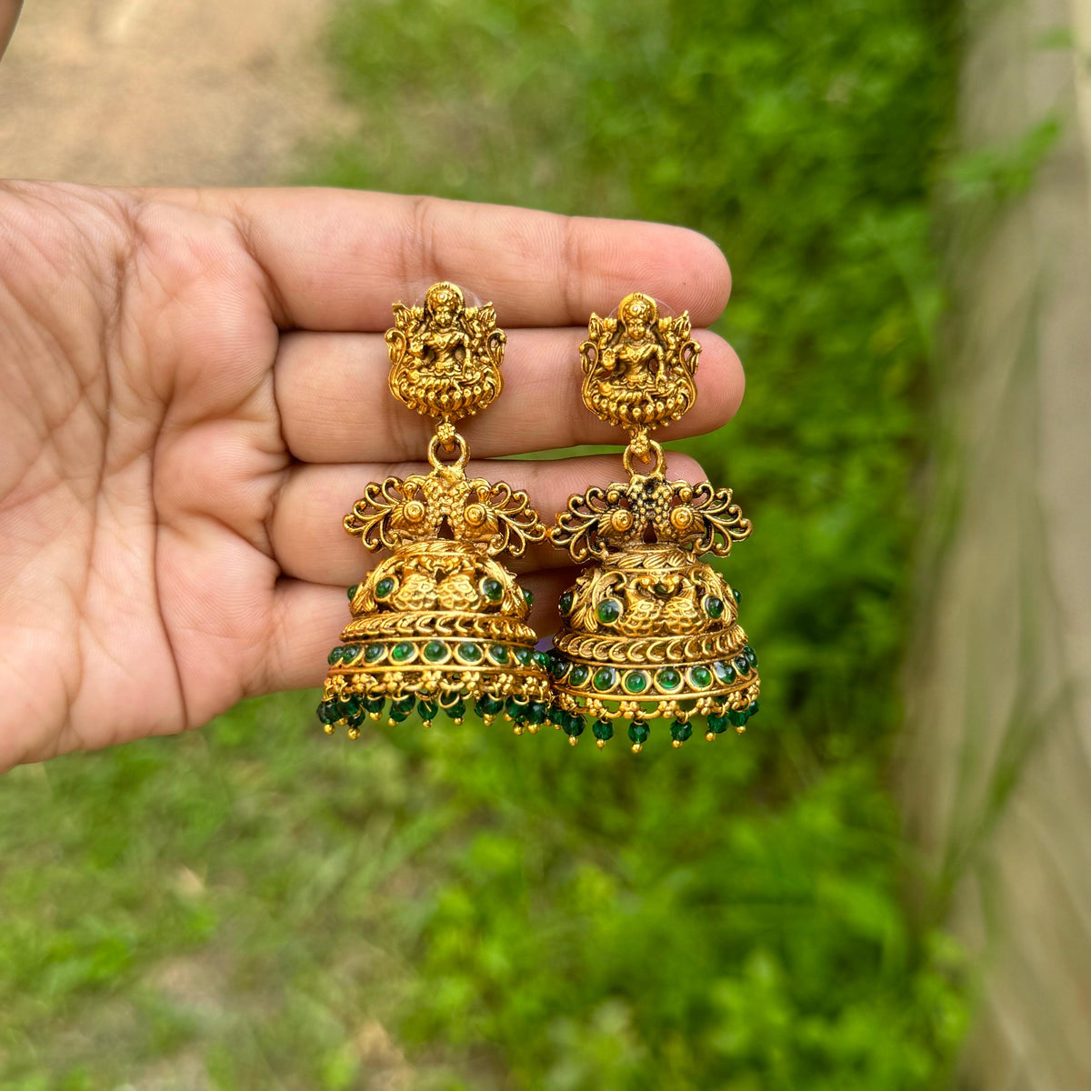 Bridal jhumkas dark green dropping
